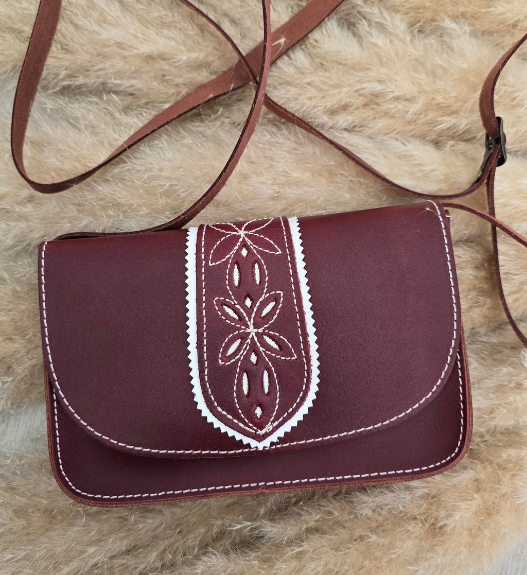 Bolso riñonera con tira picada